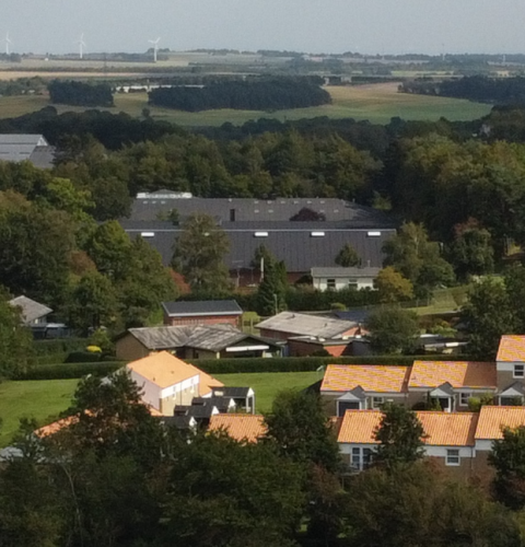 Dronefoto af forskellige typer boliger